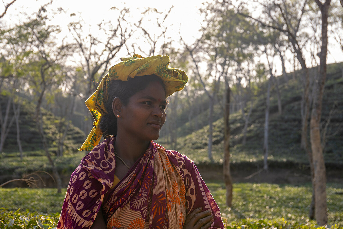 Portrait photo of a woman worker in a tea plant in Bangladesh