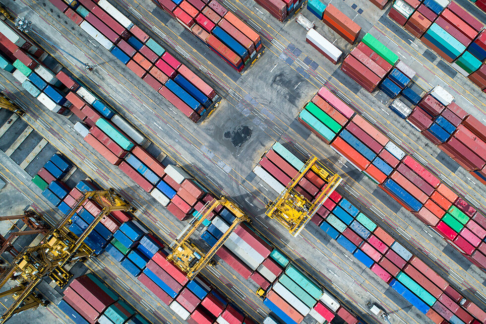 Aerial view of around a hundred of containers in a port