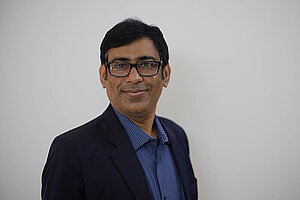 A portrait photo of a Bangladeshi man.