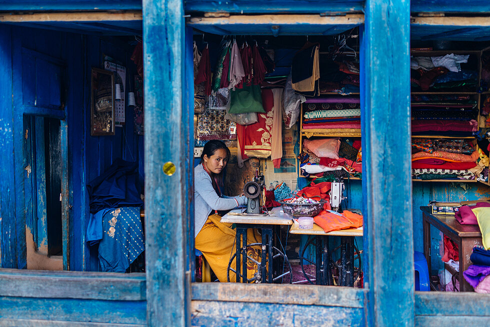 Woman working in a little shop in central square of Bhaktapur