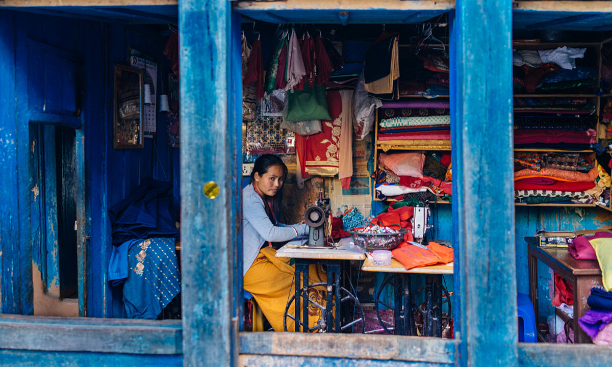 Woman working in a little shop in central square of Bhaktapur
