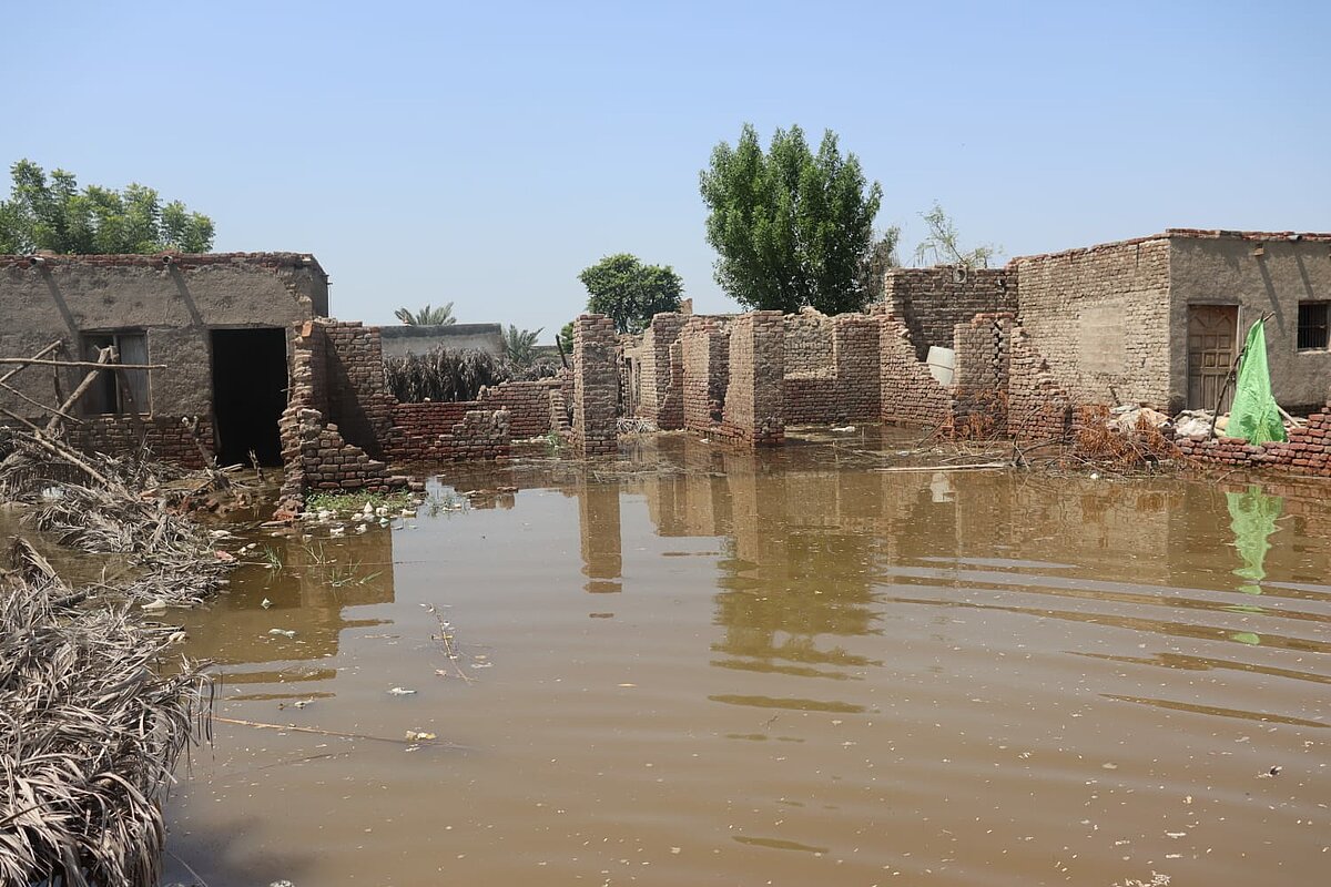 A view of destroyed houses in Khairpur