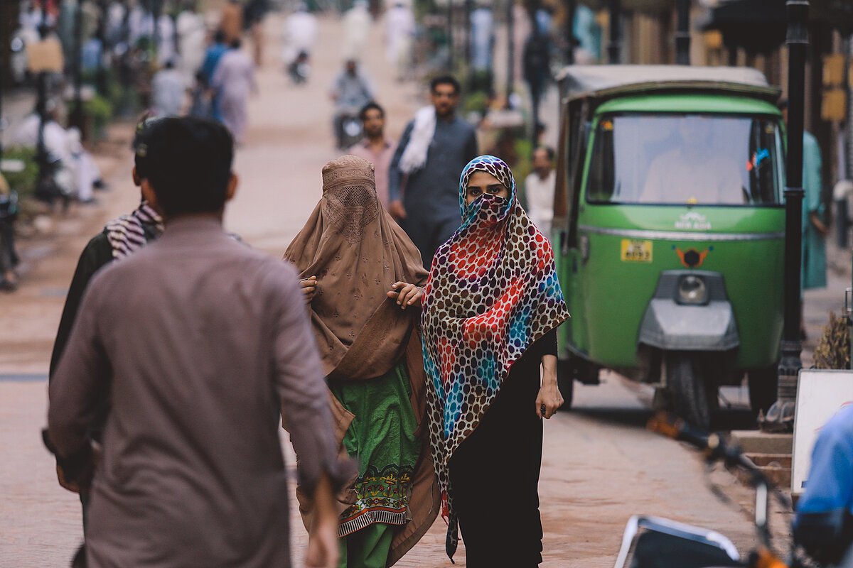 Local People on a crowded street of a city in Pakistan.